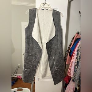Gray and white vest. Size small. Never worn